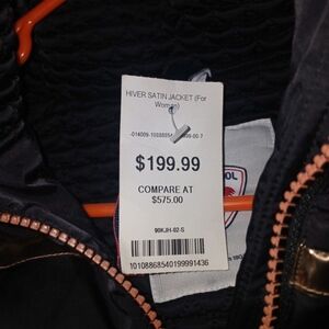 Rossignol Black and Gold Ski Jacket for Winter Adventures